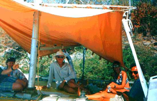 Sheltering from the sun under the cockpit awning